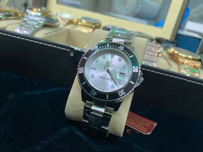 Rolex Silver With Rotating Bazel 020 Lexxiv.com