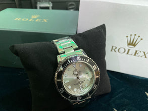 Rolex Silver With Rotating Bazel 020 Lexxiv.com